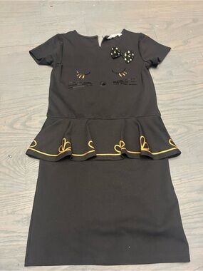 Girls Black Ruffle Hem Skirt with Yellow Trim